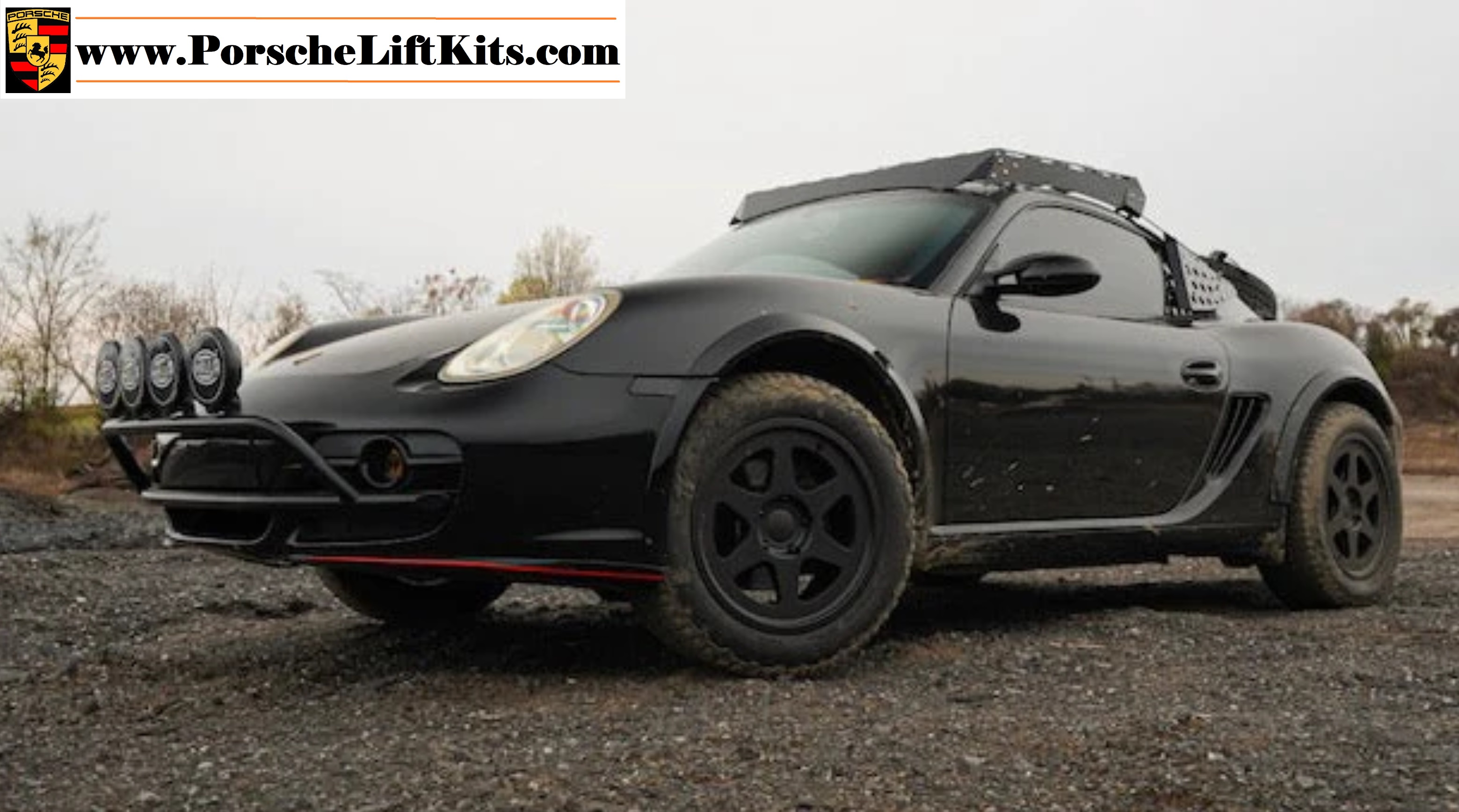 2005 Porsche Cayman 987 with two inch lift kit and larger 27-inch all-terrain tires.